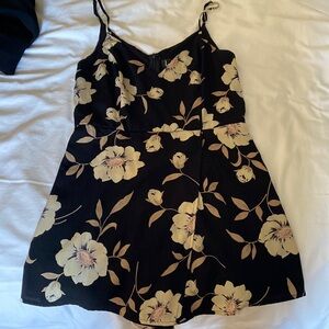 Lulus romper with skirt flap in front and adjustable straps